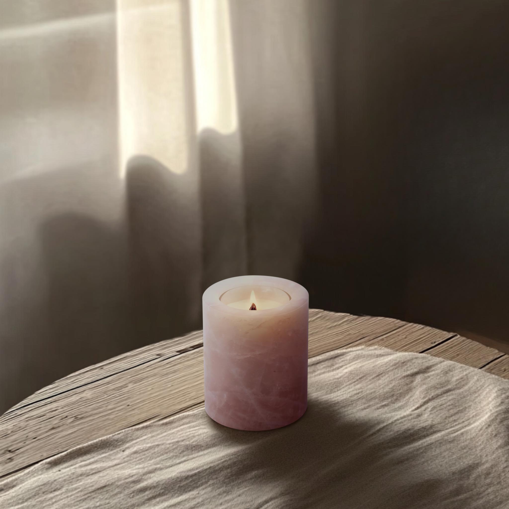 Rose Quartz crystal candle holder softly glowing – wellness-inspired home decor piece
